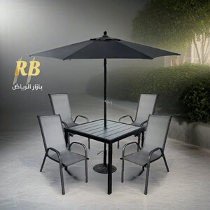 طقم جلوس خارجي مع مظلة باللون الأسود