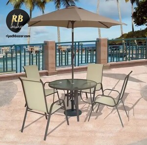 طاولة طعام دائرية مع 4 كراسي ومظلة